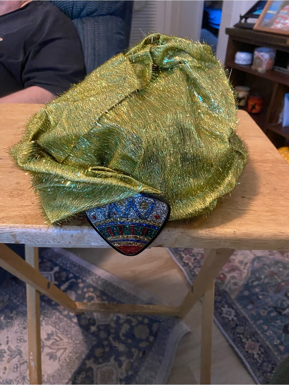Women’s Shimmery Green Evening Bag with Decorative Emblem